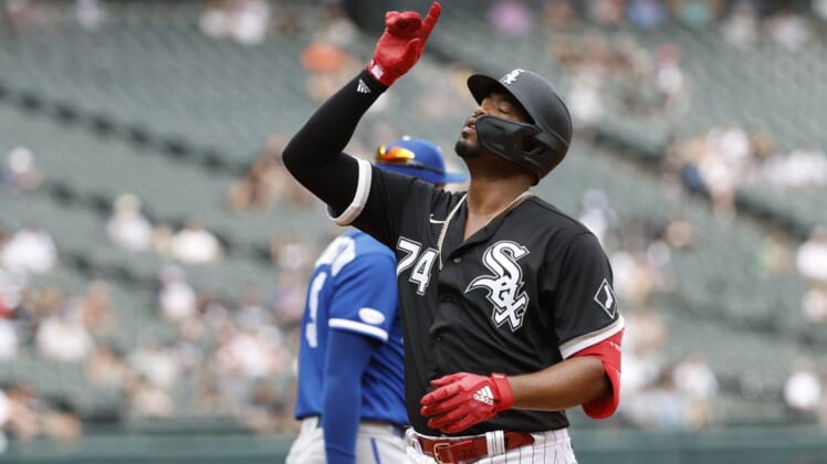Aug 3, 2022; Chicago, Illinois, USA; Chicago White Sox left fielder Eloy Jimenez (74) reacts after hitting a single against the Kansas City Royals during the fifth inning at Guaranteed Rate Field. Mandatory Credit: Kamil Krzaczynski-USA TODAY Sports