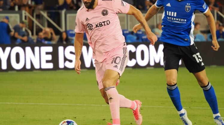 Aug 3, 2022; San Jose, California, USA; Inter Miami FC attacker Gonzalo Higuain (10) brings the ball down the field ahead of San Jose Earthquakes defender Nathan (13) during the second half at PayPal Park. Mandatory Credit: Kelley L Cox-USA TODAY Sports