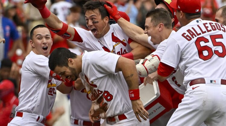 Aug 4, 2022; St. Louis, Missouri, USA;  St. Louis Cardinals right fielder Lars Nootbaar (21) celebrates with teammates after hitting a walk-off one run single against the Chicago Cubs during the ninth inning at Busch Stadium. Mandatory Credit: Jeff Curry-USA TODAY Sports