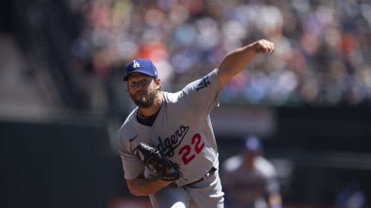 Aug 4, 2022; San Francisco, California, USA; Los Angeles Dodgers starting pitcher Clayon Kershaw (22) delivers a pitch against the San Francisco Giants during the first inning at Oracle Park. Mandatory Credit: D. Ross Cameron-USA TODAY Sports