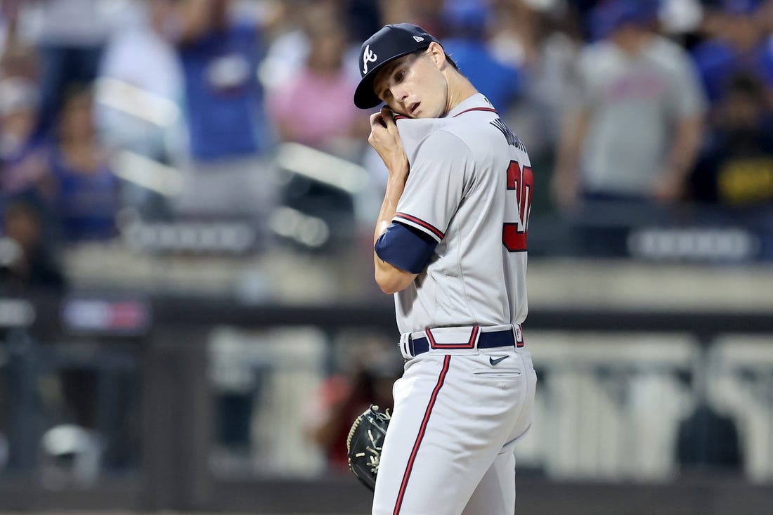 Aug 4, 2022; New York City, New York, USA; Atlanta Braves starting pitcher Kyle Wright (30) reacts during the third inning against the New York Mets at Citi Field. Mandatory Credit: Brad Penner-USA TODAY Sports