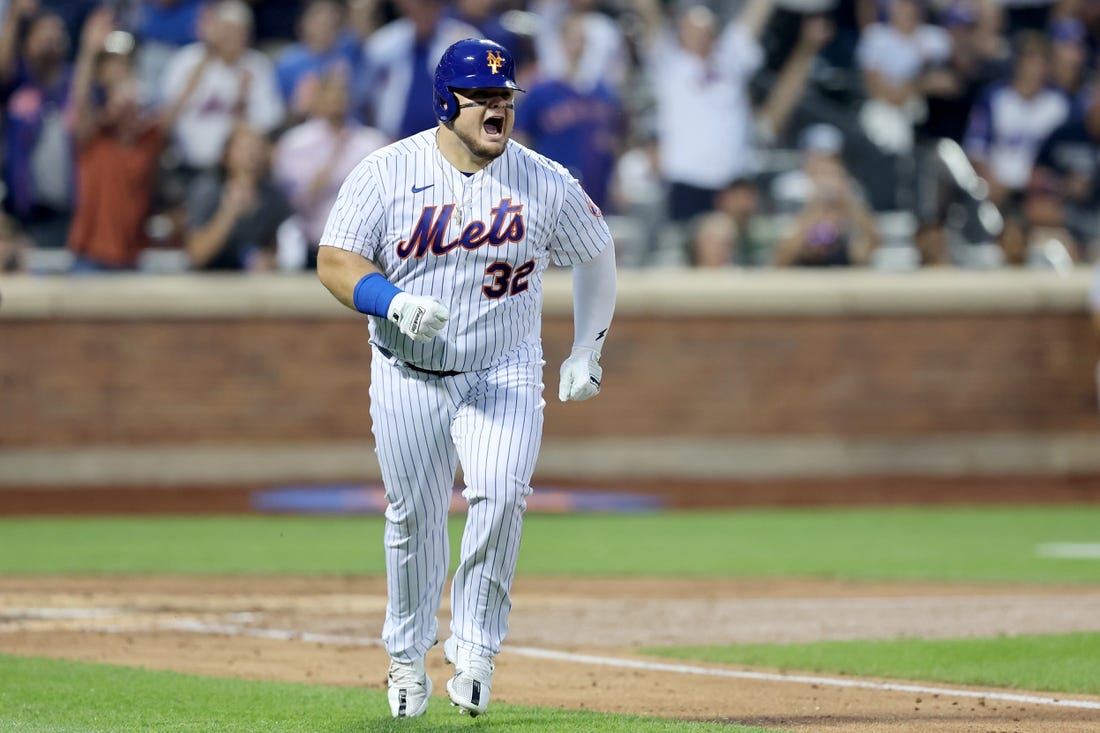 New York Mets' Tyler Naquin watches his home run during the second inning  of the team's baseball game against the Atlanta Braves on Thursday, Aug. 4,  2022, in New York. (AP Photo/Frank