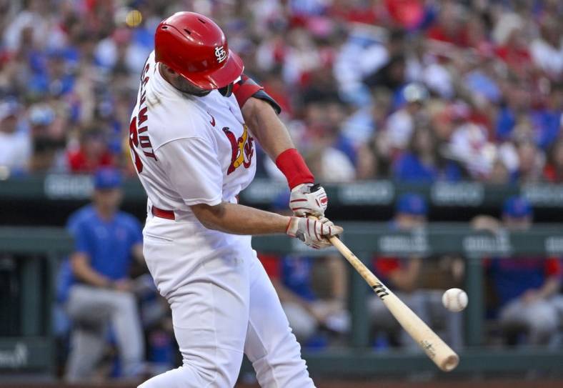 Aug 4, 2022; St. Louis, Missouri, USA;  St. Louis Cardinals designated hitter Paul Goldschmidt (46) hits a single against the Chicago Cubs during the first inning at Busch Stadium. Mandatory Credit: Jeff Curry-USA TODAY Sports