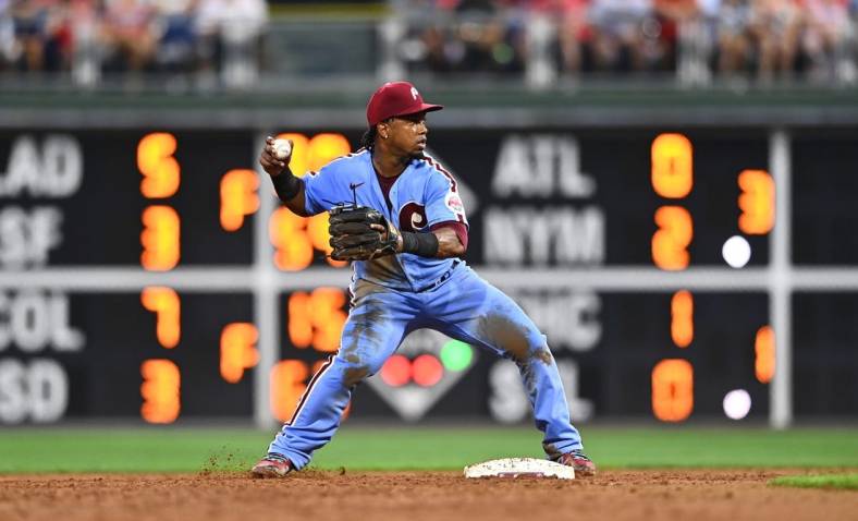 Aug 4, 2022; Philadelphia, Pennsylvania, USA; Philadelphia Phillies second baseman Jean Segura (2) forces an out at second against the Washington Nationals in the third inning at Citizens Bank Park. Mandatory Credit: Kyle Ross-USA TODAY Sports