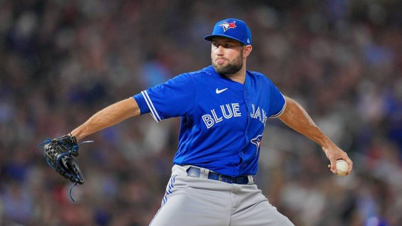 Aug 4, 2022; Minneapolis, Minnesota, USA; Toronto Blue Jays relief pitcher Tim Mayza (58) pitches against the Minnesota Twins in the seventh inning at Target Field. Mandatory Credit: Brad Rempel-USA TODAY Sports