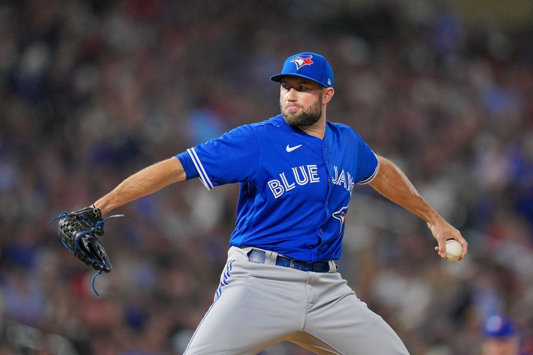 Aug 4, 2022; Minneapolis, Minnesota, USA; Toronto Blue Jays relief pitcher Tim Mayza (58) pitches against the Minnesota Twins in the seventh inning at Target Field. Mandatory Credit: Brad Rempel-USA TODAY Sports