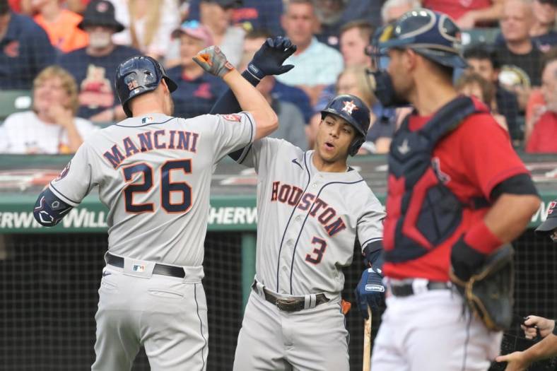 Aug 5, 2022; Cleveland, Ohio, USA; Houston Astros designated hitter Trey Mancini (26) celebrates with shortstop Jeremy Pena (3) after hitting a home run during the second inning against the Cleveland Guardians at Progressive Field. Mandatory Credit: Ken Blaze-USA TODAY Sports