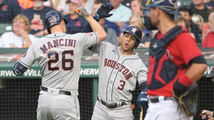 Aug 5, 2022; Cleveland, Ohio, USA; Houston Astros designated hitter Trey Mancini (26) celebrates with shortstop Jeremy Pena (3) after hitting a home run during the second inning against the Cleveland Guardians at Progressive Field. Mandatory Credit: Ken Blaze-USA TODAY Sports