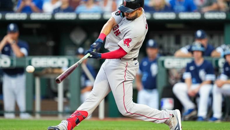 Aug 5, 2022; Kansas City, Missouri, USA; Boston Red Sox first baseman Eric Hosmer (35) hits an RBI double against the Kansas City Royals during the second inning at Kauffman Stadium. Mandatory Credit: Jay Biggerstaff-USA TODAY Sports