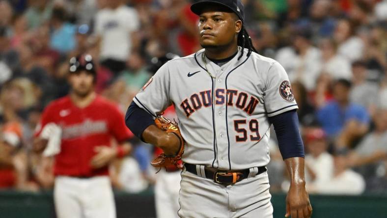 Aug 5, 2022; Cleveland, Ohio, USA; Houston Astros starting pitcher Framber Valdez (59) reacts after giving up a run during the seventh inning against the Cleveland Guardians at Progressive Field. Mandatory Credit: Ken Blaze-USA TODAY Sports