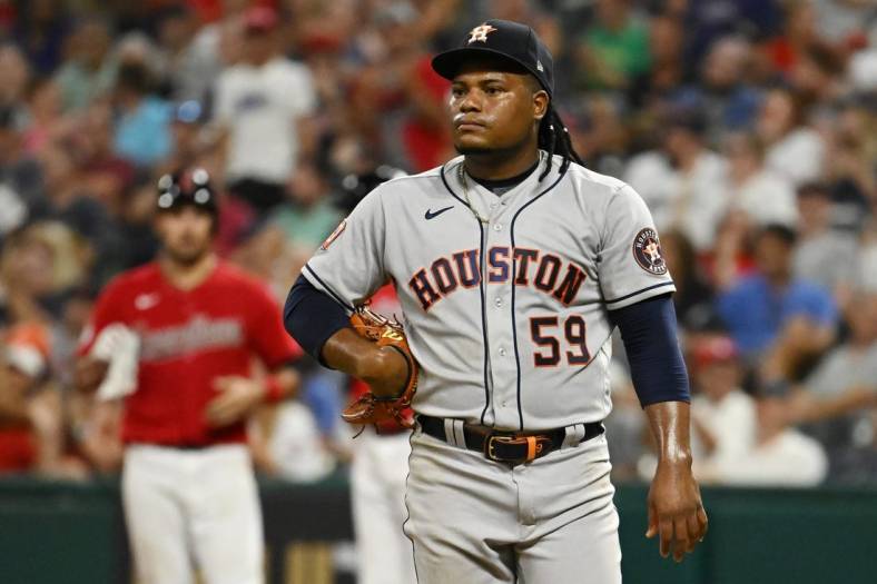 Aug 5, 2022; Cleveland, Ohio, USA; Houston Astros starting pitcher Framber Valdez (59) reacts after giving up a run during the seventh inning against the Cleveland Guardians at Progressive Field. Mandatory Credit: Ken Blaze-USA TODAY Sports