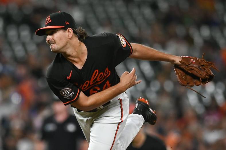 Aug 5, 2022; Baltimore, Maryland, USA; Baltimore Orioles starting pitcher Dean Kremer (64) throws a first inning pitch against the Pittsburgh Pirates  at Oriole Park at Camden Yards. Mandatory Credit: Tommy Gilligan-USA TODAY Sports