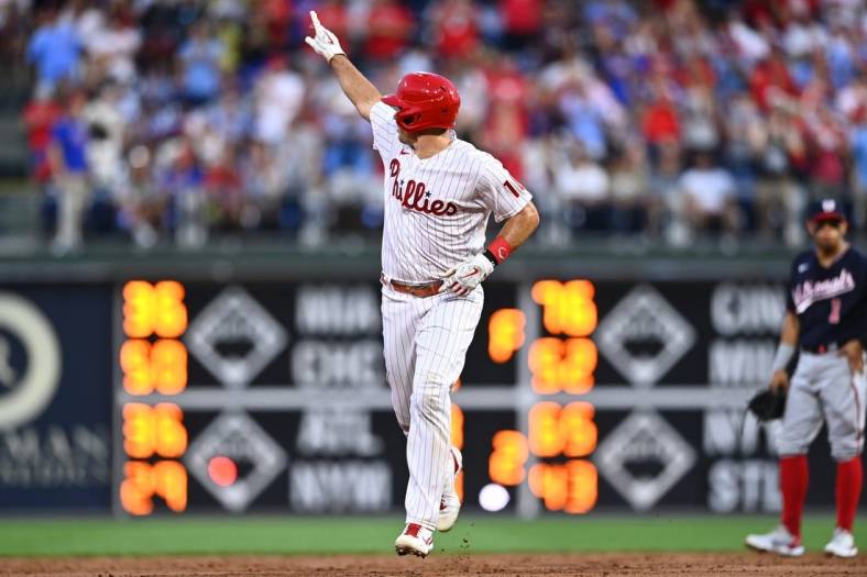 Aug 5, 2022; Philadelphia, Pennsylvania, USA; Philadelphia Phillies catcher JT Realmuto (10) reacts as he rounds the bases after hitting a two-run home run against the Washington Nationals in the third inning at Citizens Bank Park. Mandatory Credit: Kyle Ross-USA TODAY Sports