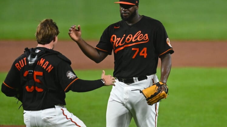 Aug 5, 2022; Baltimore, Maryland, USA;  Baltimore Orioles relief pitcher Felix Bautista (74) celebrates with  catcher Adley Rutschman (35) after the game against the Pittsburgh Pirates at Oriole Park at Camden Yards. Mandatory Credit: Tommy Gilligan-USA TODAY Sports
