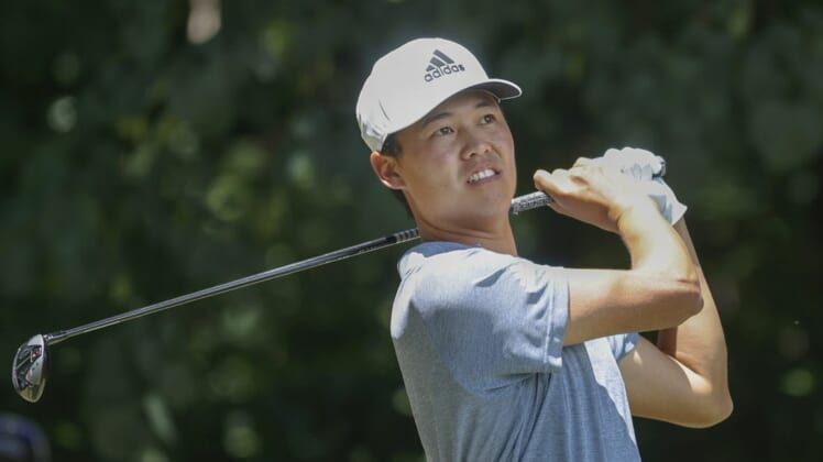 Aug 6, 2022; Greensboro, North Carolina, USA; Brandon Wu watches his tee shot on the second tee during the third round of the Wyndham Championship golf tournament. Mandatory Credit: Nell Redmond-USA TODAY Sports