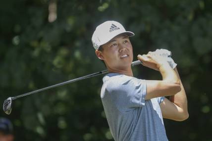 Aug 6, 2022; Greensboro, North Carolina, USA; Brandon Wu watches his tee shot on the second tee during the third round of the Wyndham Championship golf tournament. Mandatory Credit: Nell Redmond-USA TODAY Sports