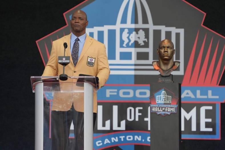 Aug 6, 2022; Canton, OH, USA; Bryant Young speaks during the Pro Football Hall of Fame Class of 2022 enshrinement  ceremony at Tom Benson Hall of Fame Stadium. Mandatory Credit: Kirby Lee-USA TODAY Sports