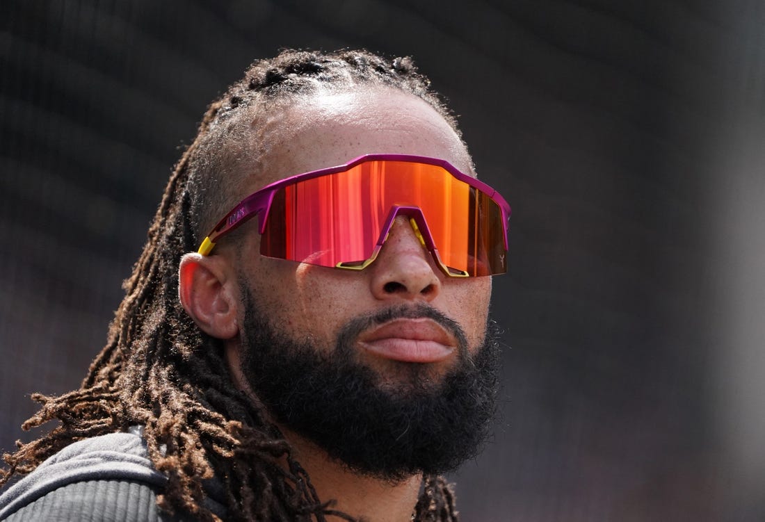 Aug 6, 2022; Chicago, Illinois, USA; Miami Marlins left fielder Billy Hamilton (6) in the dugout during the fourth inning against the Chicago Cubs at Wrigley Field. Mandatory Credit: David Banks-USA TODAY Sports