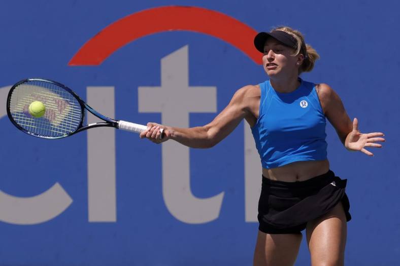 Aug 6, 2022; Washington, DC, USA; Daria Saville (AUS) hits a forehand against Kaia Kanepi (EST) (not pictured) in a women's singles semifinal on day six of the Citi Open at Rock Creek Park Tennis Center. Mandatory Credit: Geoff Burke-USA TODAY Sports