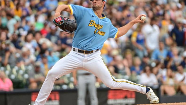 Aug 6, 2022; Milwaukee, Wisconsin, USA; Milwaukee Brewers pitcher Aaron Ashby (26) throws against the Cincinnati Reds in the first inning at American Family Field. Mandatory Credit: Benny Sieu-USA TODAY Sports