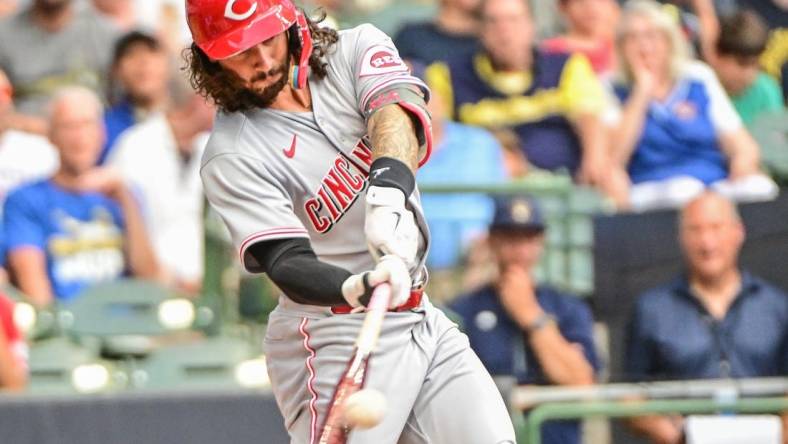 Aug 6, 2022; Milwaukee, Wisconsin, USA;  Cincinnati Reds second baseman Jonathan India (6) hits an RBI double in the second inning against the Milwaukee Brewers at American Family Field. Mandatory Credit: Benny Sieu-USA TODAY Sports