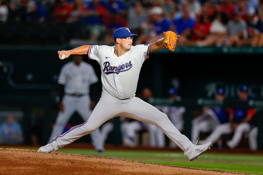 Aug 6, 2022; Arlington, Texas, USA; Texas Rangers starting pitcher Dane Dunning (33) throws against the Chicago White Sox during the fourth inning at Globe Life Field. Mandatory Credit: Andrew Dieb-USA TODAY Sports