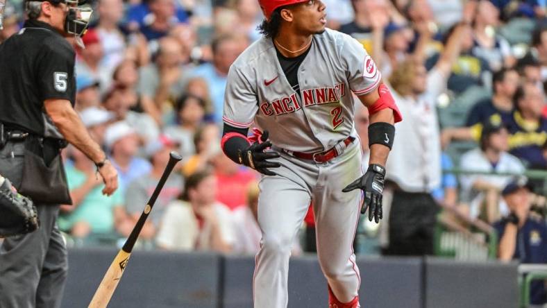 Aug 6, 2022; Milwaukee, Wisconsin, USA;  Cincinnati Reds shortstop Jose Barrero (2) watches after hitting a two-run home run in the fourth inning against the Milwaukee Brewers at American Family Field. Mandatory Credit: Benny Sieu-USA TODAY Sports