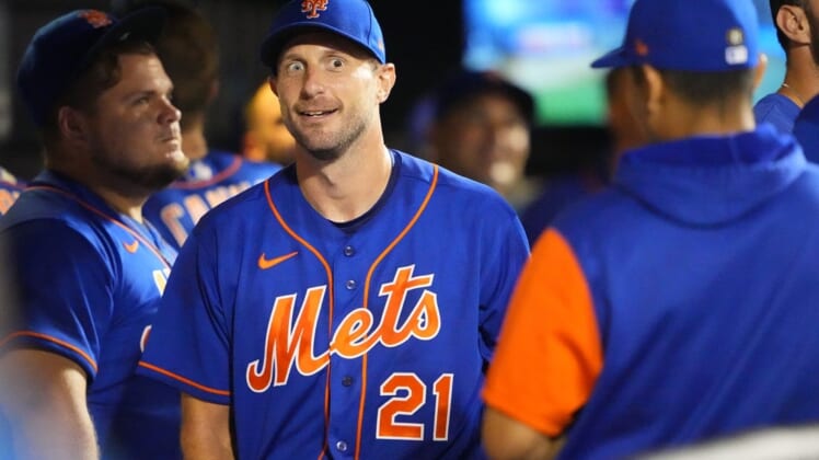 Aug 6, 2022; New York City, New York, USA;  New York Mets pitcher Max Scherzer (21) in the dugout during the seventh inning against the Atlanta Braves at Citi Field. Mandatory Credit: Gregory Fisher-USA TODAY Sports