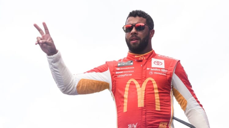Aug 7, 2022; Brooklyn, Michigan, USA; NASCAR Cup Series driver Bubba Wallace (23) is introduced before the race at Michigan International Speedway. Mandatory Credit: Tim Fuller-USA TODAY Sports