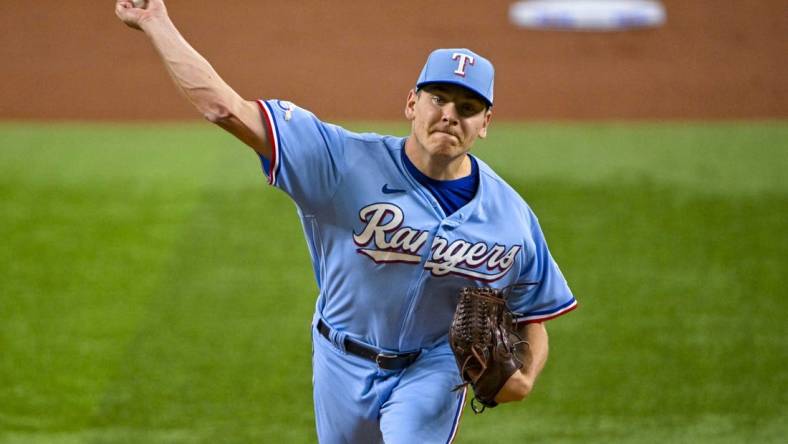 Aug 7, 2022; Arlington, Texas, USA; Texas Rangers starting pitcher Spencer Howard (31) pitches against the Chicago White Sox during the first inning at Globe Life Field. Mandatory Credit: Jerome Miron-USA TODAY Sports