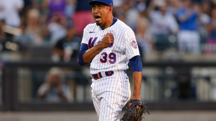 Aug 7, 2022;  New York City, New York, USA;  New York Mets relief pitcher Edwin Diaz (39) reacts after closing the game against the Atlanta Braves at Citi Field.  Mandatory Credit: Vincent Carchietta-USA TODAY Sports