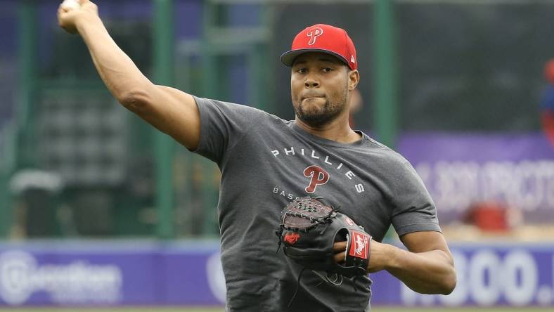 Jul 31, 2022; Pittsburgh, Pennsylvania, USA;  Philadelphia Phillies relief pitcher Jeurys Familia (31) throws in the outfield before the game against the Pittsburgh Pirates at PNC Park. Mandatory Credit: Charles LeClaire-USA TODAY Sports