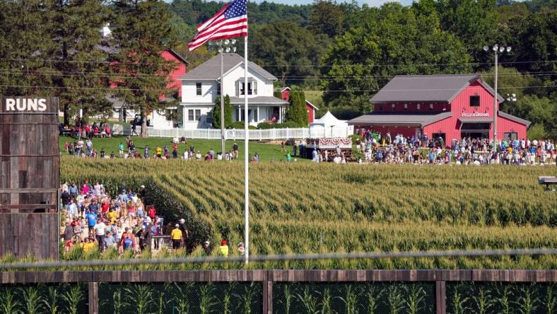 Fans make their way through the corn from Field of Dreams movie site to the game site in Dyersville, Tuesday, Aug. 9, 2022.

Fod12 Jpg