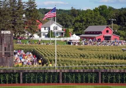 Fans make their way through the corn from Field of Dreams movie site to the game site in Dyersville, Tuesday, Aug. 9, 2022.

Fod12 Jpg