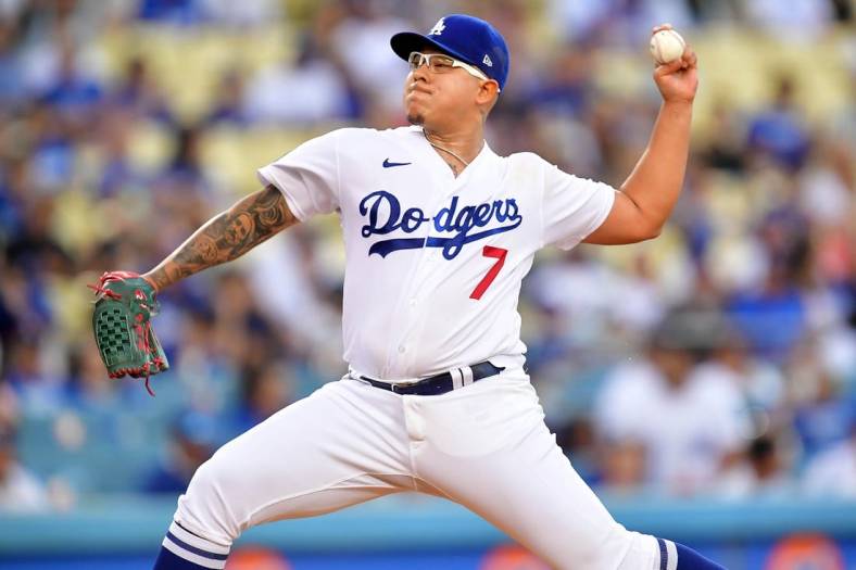 Aug 9, 2022; Los Angeles, California, USA; Los Angeles Dodgers starting pitcher Julio Urias (7) throws against the Minnesota Twins during the first inning at Dodger Stadium. Mandatory Credit: Gary A. Vasquez-USA TODAY Sports