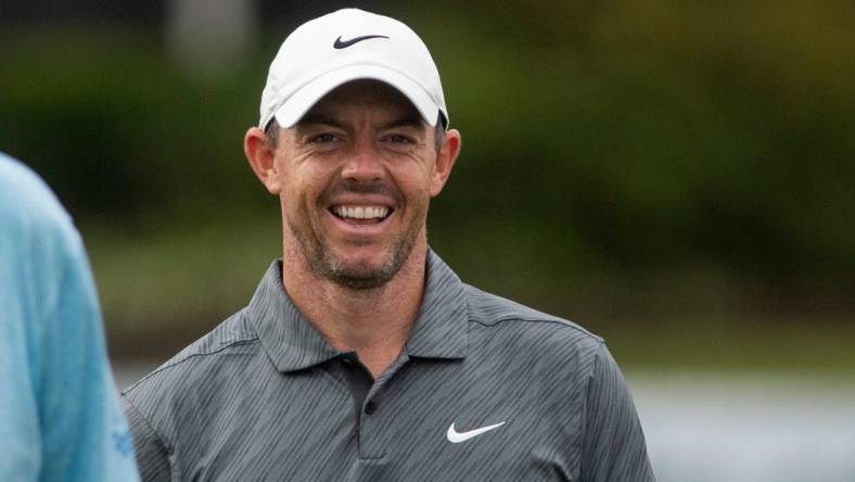 Rory McIlroy smiles while walking off the green of the 18th hole after finishing his round of the FedEx St. Jude Championship Pro-Am at TPC Southwind on Wednesday, August 10, 2022, in Memphis, TN.