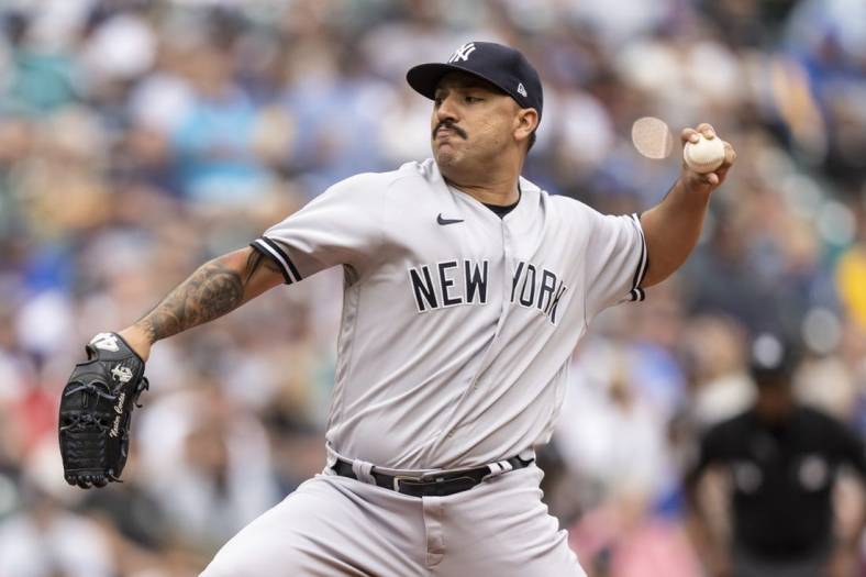 Aug 10, 2022; Seattle, Washington, USA; New York Yankees starter Nestor Cortes (65) delivers a pitch during the first inning against the Seattle Mariners at T-Mobile Park. Mandatory Credit: Stephen Brashear-USA TODAY Sports