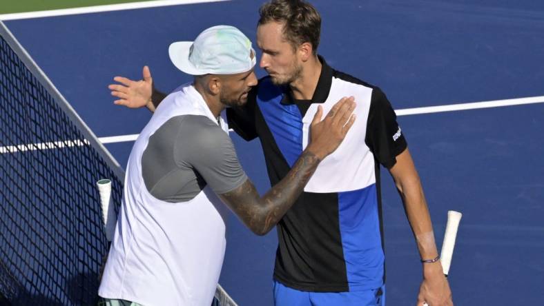 Aug 10, 2022; Montreal, QC, Canada; Nick Kyrgios (AUS) (left) and Daniil Medvedev hug in second round play at IGA Stadium. Mandatory Credit: Eric Bolte-USA TODAY Sports