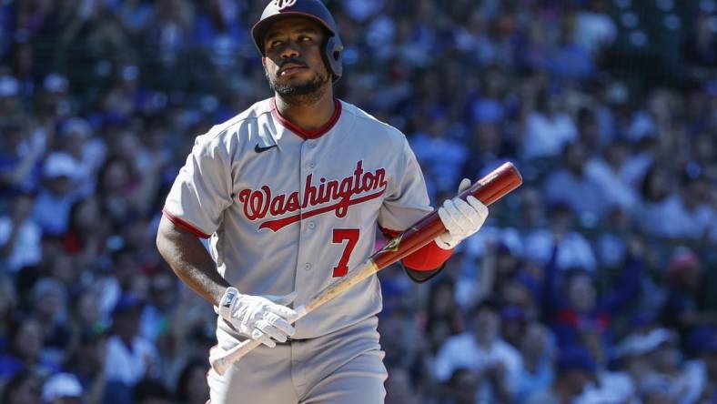 Aug 10, 2022; Chicago, Illinois, USA; Washington Nationals third baseman Maikel Franco (7) reacts after striking out against the Chicago Cubs during the eight inning at Wrigley Field. Mandatory Credit: Kamil Krzaczynski-USA TODAY Sports