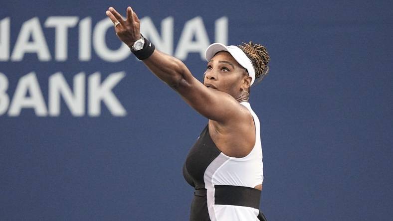 Aug 10, 2022; Toronto, ON, Canada; Serena Williams (USA) serves to Belinda Bencic (not pictured) at Sobeys Stadium. Mandatory Credit: John E. Sokolowski-USA TODAY Sports