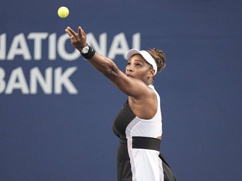 Aug 10, 2022; Toronto, ON, Canada; Serena Williams (USA) serves to Belinda Bencic (not pictured) at Sobeys Stadium. Mandatory Credit: John E. Sokolowski-USA TODAY Sports