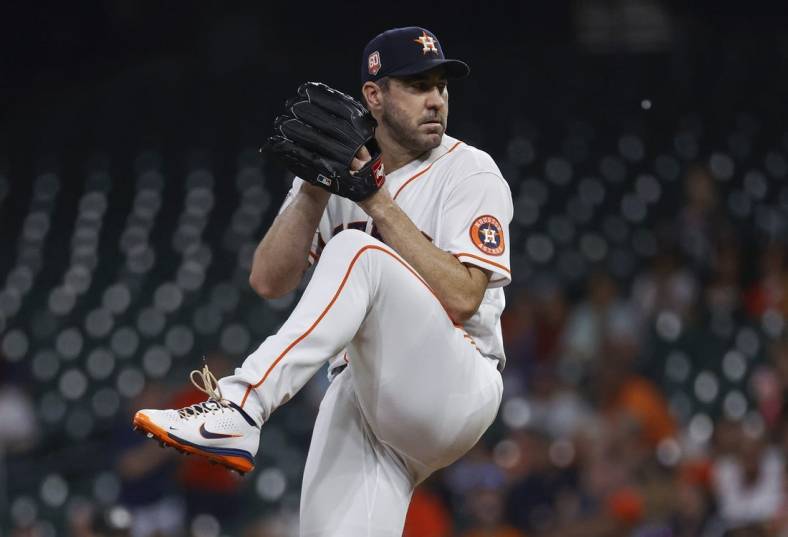 Aug 10, 2022; Houston, Texas, USA; Houston Astros starting pitcher Justin Verlander (35) delivers a pitch during the first inning against the Texas Rangers at Minute Maid Park. Mandatory Credit: Troy Taormina-USA TODAY Sports