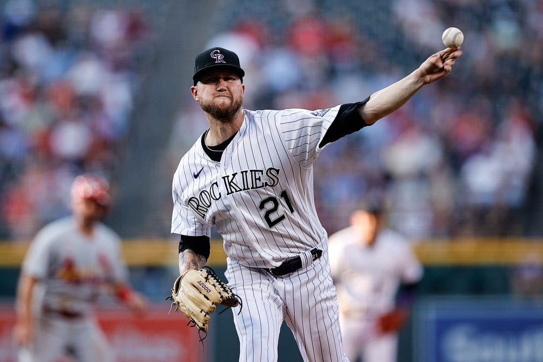 Aug 10, 2022; Denver, Colorado, USA; Colorado Rockies starting pitcher Kyle Freeland (21) pitches in the first inning against the St. Louis Cardinals at Coors Field. Mandatory Credit: Isaiah J. Downing-USA TODAY Sports