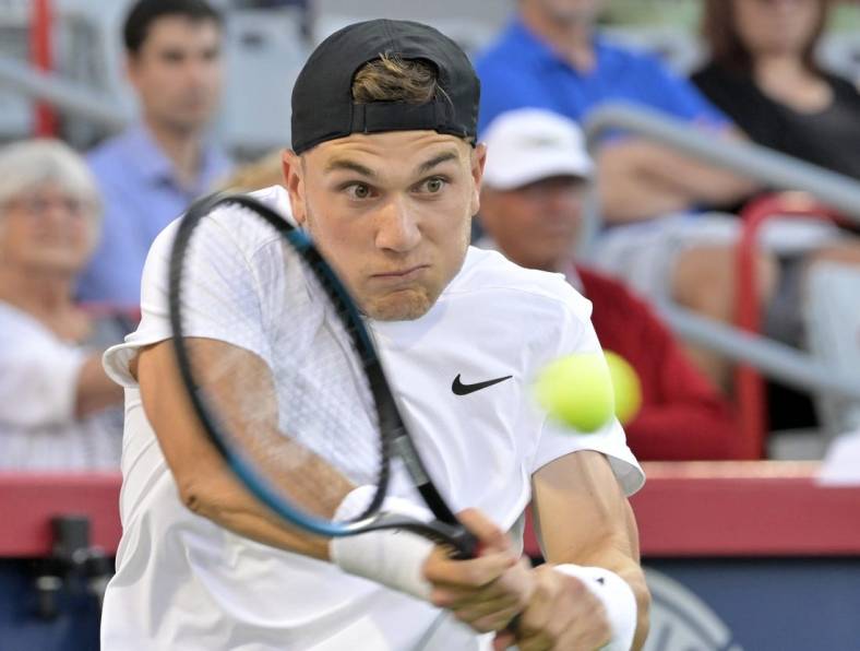 Aug 11, 2022; Montreal, QC, Canada; Jack Draper (GBR) hits a backhand against Gael Monfils (FRA) (not pictured) in third round play in the National Bank Open at IGA Stadium. Mandatory Credit: Eric Bolte-USA TODAY Sports