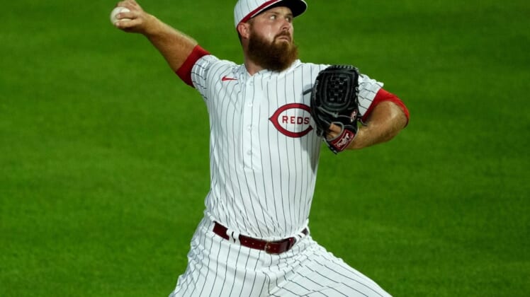 Cincinnati Reds relief pitcher Buck Farmer (46) delivers a pitch during the fifth inning of a baseball game against the Chicago Cubs, Thursday, Aug. 11, 2022, at the MLB Field of Dreams stadium in Dyersville, Iowa.Mlb Field Of Dreams Game Cincinnati Reds At Chicago Cubs Aug 11 3942