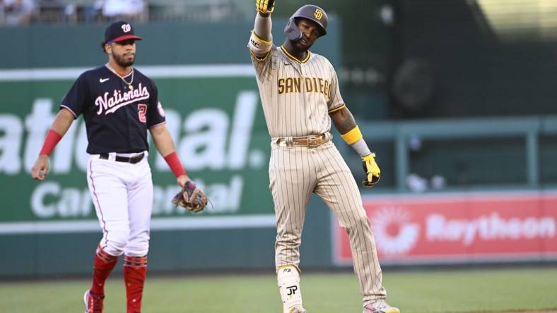 Aug 12, 2022; Washington, District of Columbia, USA; San Diego Padres left fielder Jurickson Profar (10) reacts after hitting a double against the Washington Nationals during the first inning at Nationals Park. Mandatory Credit: Brad Mills-USA TODAY Sports