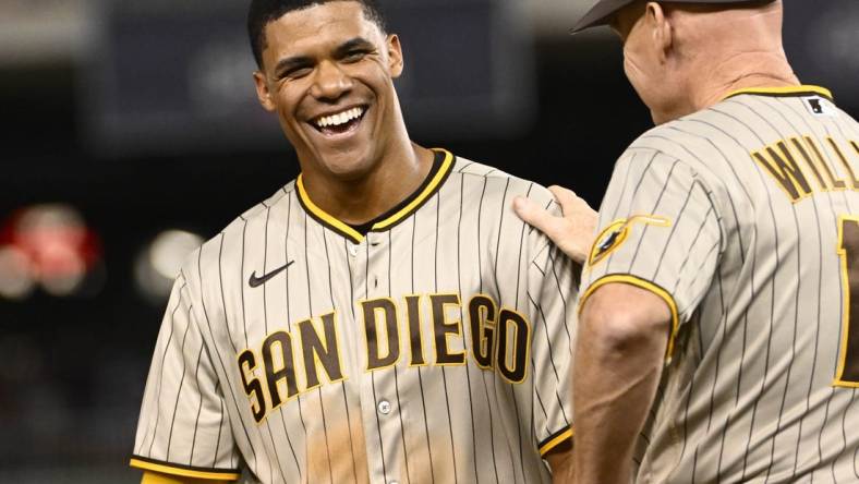 Aug 12, 2022; Washington, District of Columbia, USA; San Diego Padres right fielder Juan Soto (22) reacts after hitting a double against the Washington Nationals during the fifth inning at Nationals Park. Mandatory Credit: Brad Mills-USA TODAY Sports