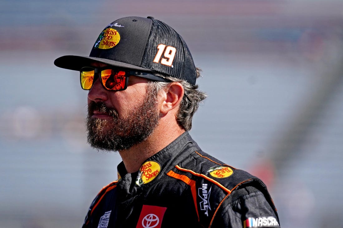 Aug 13, 2022; Richmond, Virginia, USA; NASCAR Cup Series driver Martin Truex Jr. (19) during practice and qualifying for the Federated Auto Parts 400 at Richmond International Raceway. Mandatory Credit: Peter Casey-USA TODAY Sports