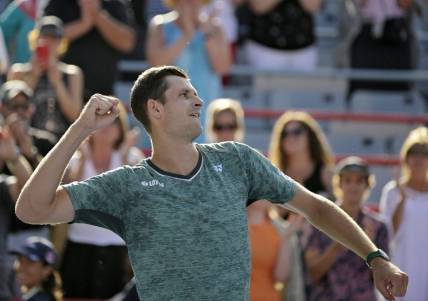 Aug 13, 2022; Montreal, QC, Canada; Hubert Hurkacz (POL) celebrates his win over Casper Ruud (NOR) (not pictured) in semifinal play in the National Bank Open at IGA Stadium. Mandatory Credit: Eric Bolte-USA TODAY Sports