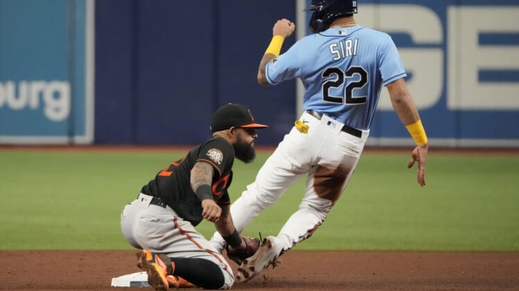 Aug 13, 2022; St. Petersburg, Florida, USA; Tampa Bay Rays center fielder Jose Siri (22) steals second base as Baltimore Orioles second baseman Rougned Odor (12) tries to make the tag during the fourth inning at Tropicana Field. Mandatory Credit: Dave Nelson-USA TODAY Sports